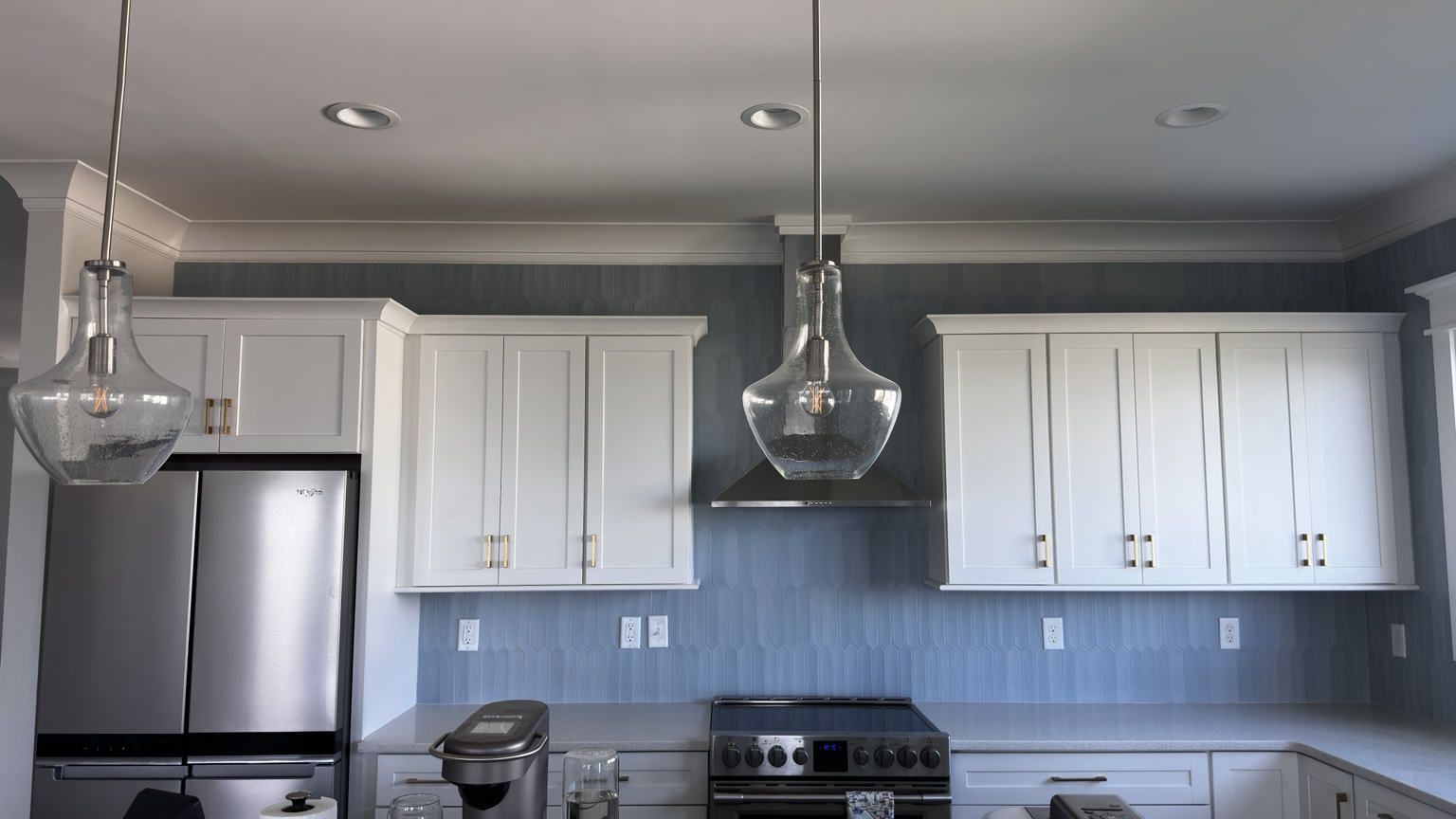Blue elongated hexagon kitchen backsplash by Straight Line Ceramic Tile in Wilmington NC